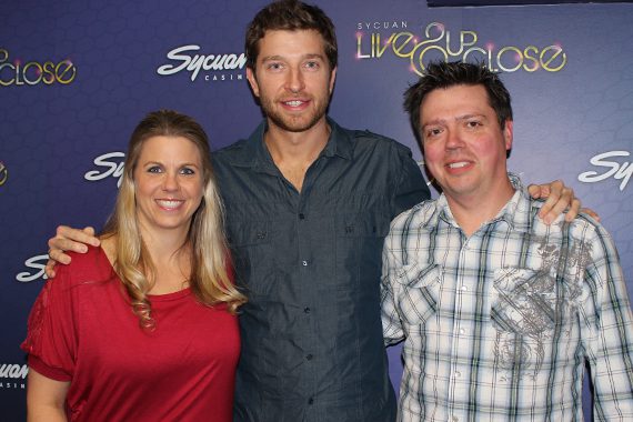 Brett Eldredge recently visited with KSON’s Kevin Callahan at the Syquan Casino in San Diego in promotion of his "Dont Ya" single, which lands at No. 70. Pictured (L-R): Emma Callahan (wife of Kevin Callahan), Brett Eldredge, and Kevin Callahan (PD KSON)