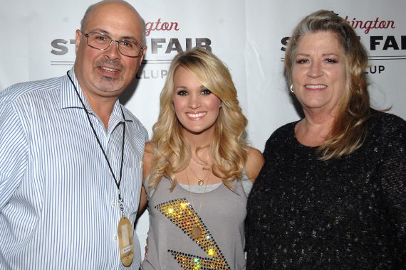 Carrie Underwood recently played Puyallup’s Washington State Fair where she visited with KKWF Seattle PD Mike Preston and his wife Terri. Pictured (L-R): Preston, Underwood, Yankovich