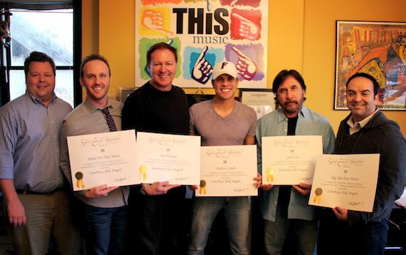 Pictured (L-R): BMI’s Bradley Collins, This Music’s Rusty Gaston, co-writer Tim Nichols, Dustin Lynch, co-writer Josh Leo, and Big Machine Music’s Mike Molinar. Photo credit: Drew Maynard