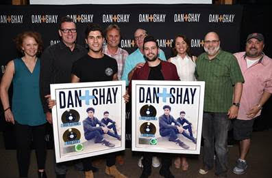 Pictured (L-R): Lisa Ray, VP Brand Management; Peter Strickland, EVP & GM, WMN; Dan Smyers; Scott Hendricks, EVP A&R; John Esposito, Chairman & CEO, WMN; Shay Mooney; Liz Kennedy, Director, Communications and Gold & Platinum Program, RIAA; Kevin Herring, SVP Promotion; Chris Palmer, VP Promotion