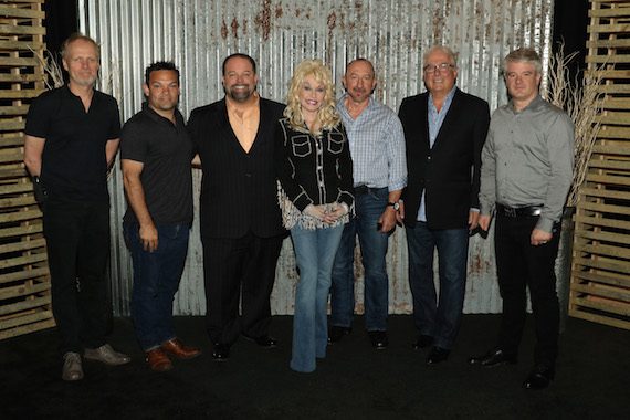 Pictured (L-R): Dean Roney, Lee Moro, Danny Nozell, Dolly Parton, Paul Owen, Richard Lachance, Martin Chouinard 